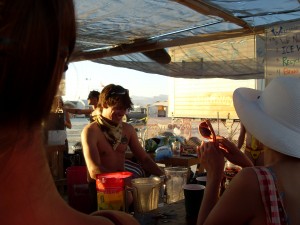 tending bar for a crowd of about 3000 dancing lunatics at the Deep End camp at Burning Man 2008