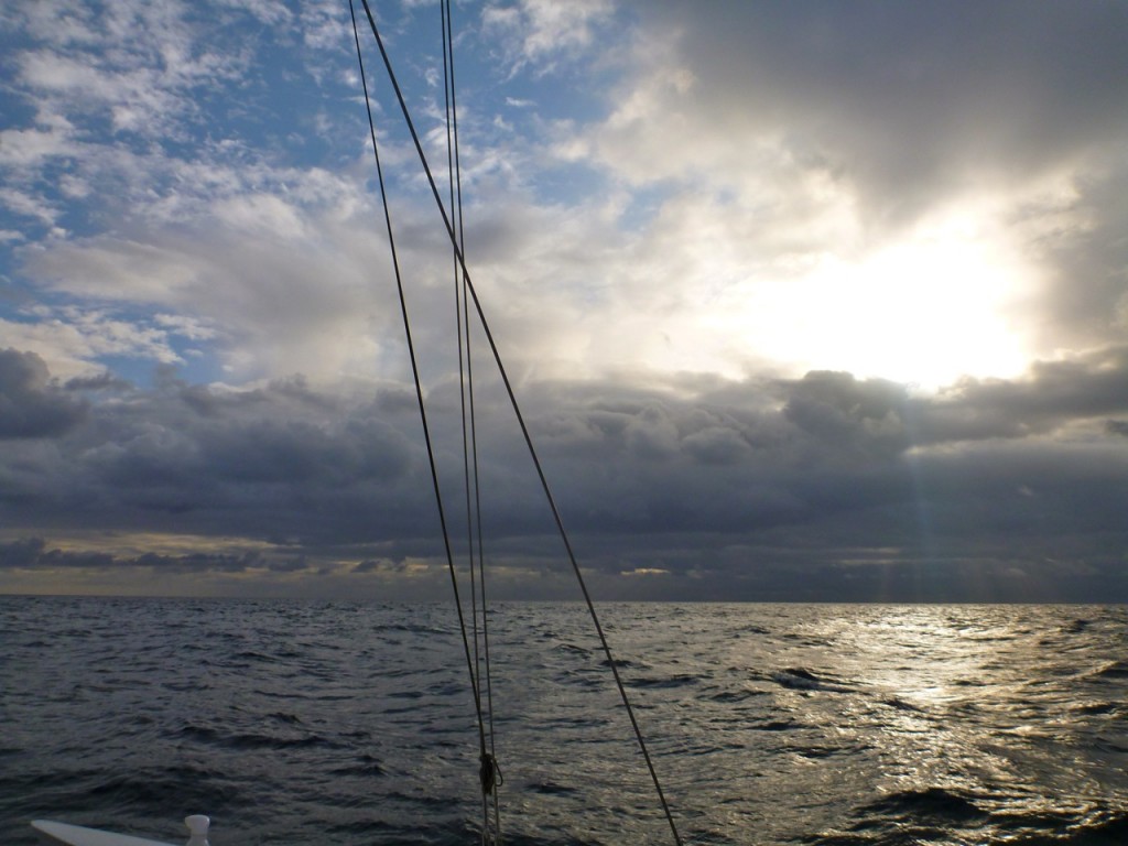 sun with rain on the horizon